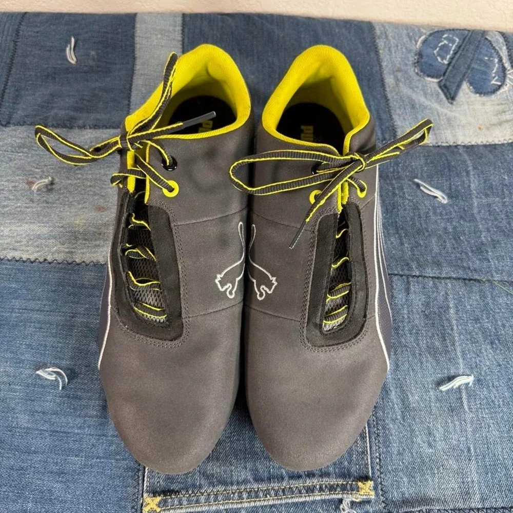 Puma black and yellow sneakers